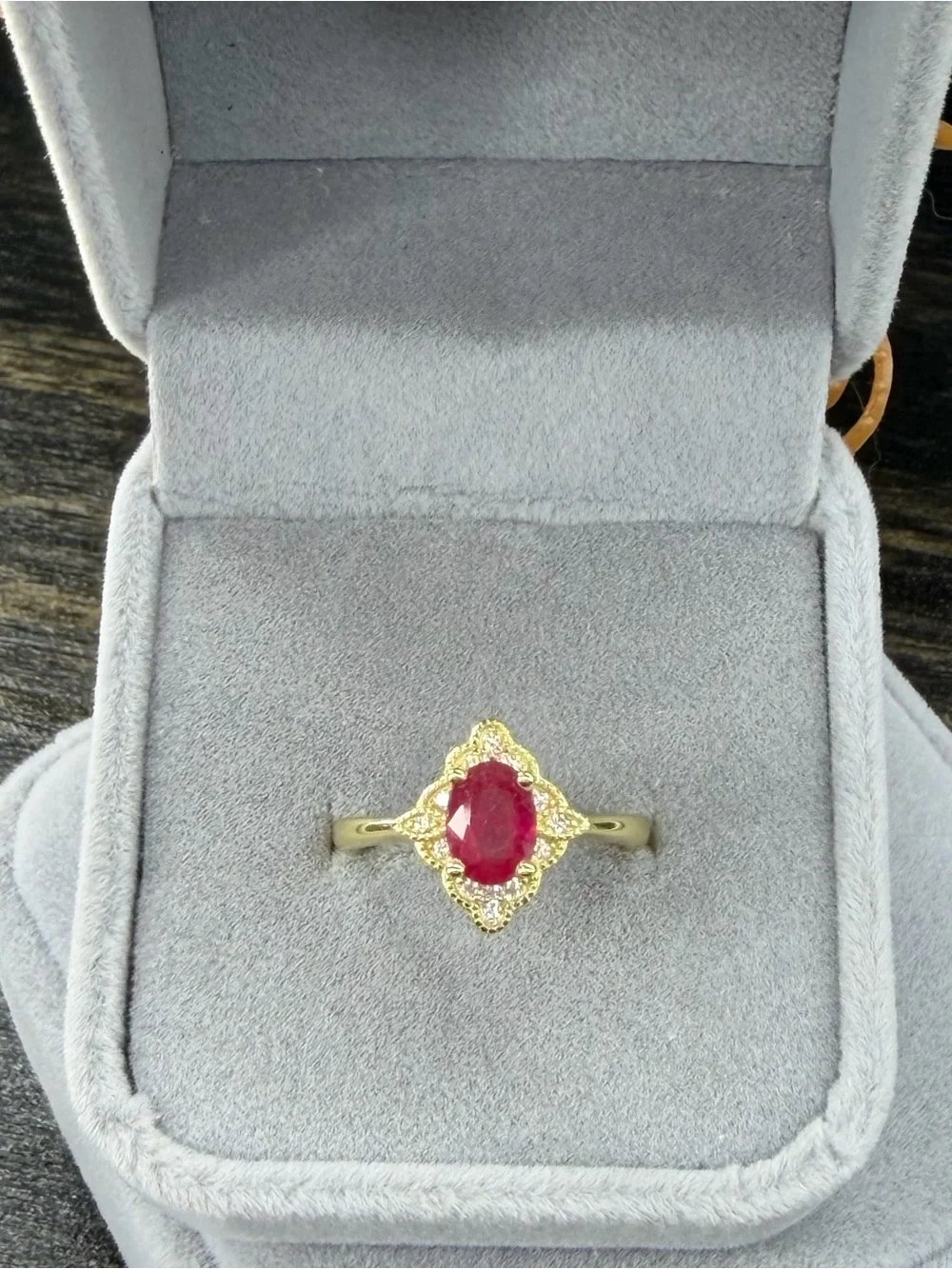 Stunning Natural 7x5mm Oval Ruby Zircon  accent in 14K Yellow GP Ring Size 6